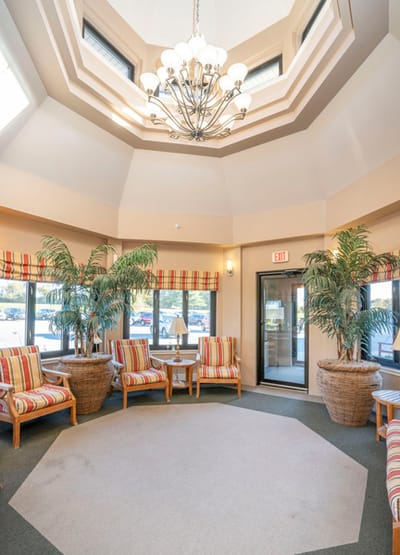 Interior view of a cozy common area with seating