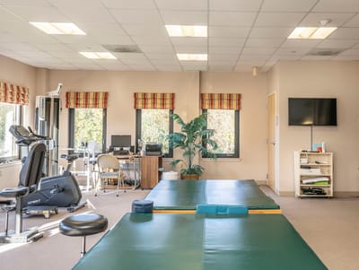 Interior view of a therapy room with equipment