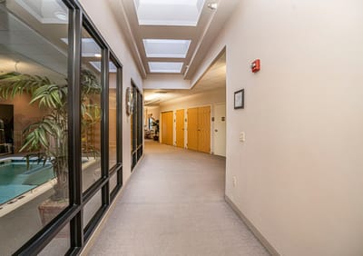 Interior hallway leading to private rooms