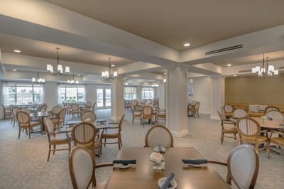 Bright dining area with elegant seating and decor