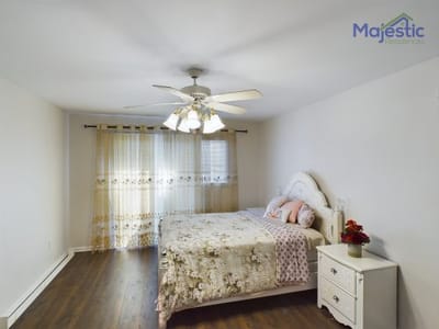 Interior of a resident room with a bed and decor