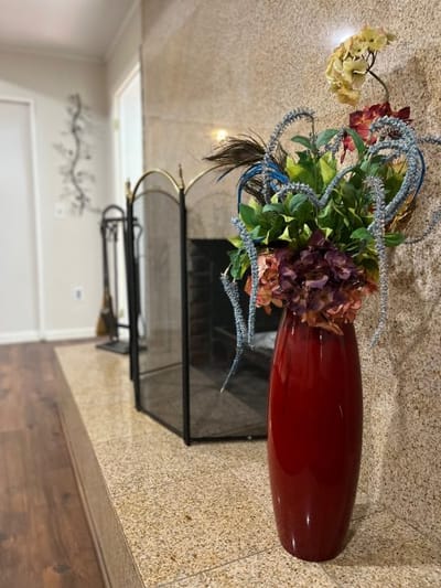 Decorative flower arrangement on a mantel