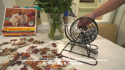 Residents playing bingo in an activity room