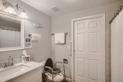 Clean and accessible bathroom with grab bars