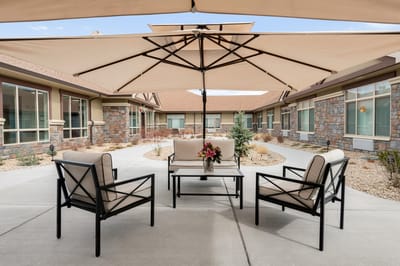 Outdoor seating area with comfortable chairs and table
