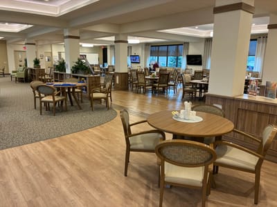 Interior view of a common area with seating and tables