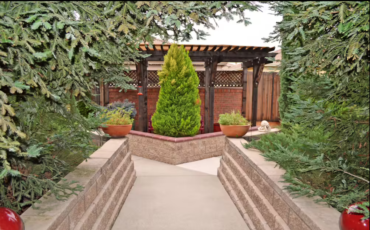 Pathway leading to a cozy outdoor seating area