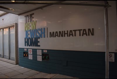 Facility logo displayed on building exterior