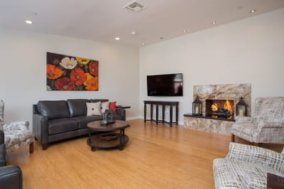 Comfortable common area with seating and artwork