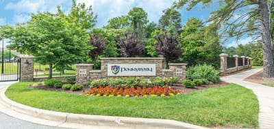 Entrance sign of Pennybyrn surrounded by greenery