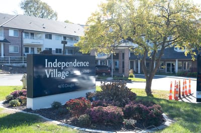 Exterior view of Independence Village entrance and sign
