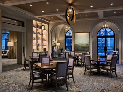 Elegant common area with tables and chairs