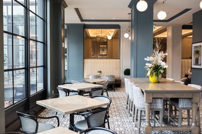 Bright dining area with modern decor and seating