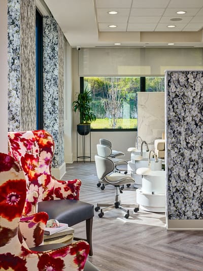 Interior view of a salon area with floral decor