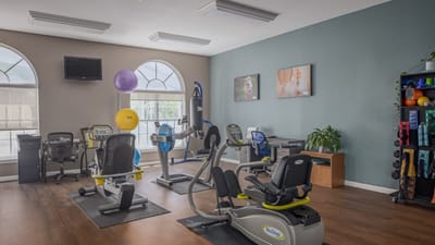 Interior view of a fitness room with exercise equipment