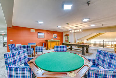 Interior view of a common area with gaming tables