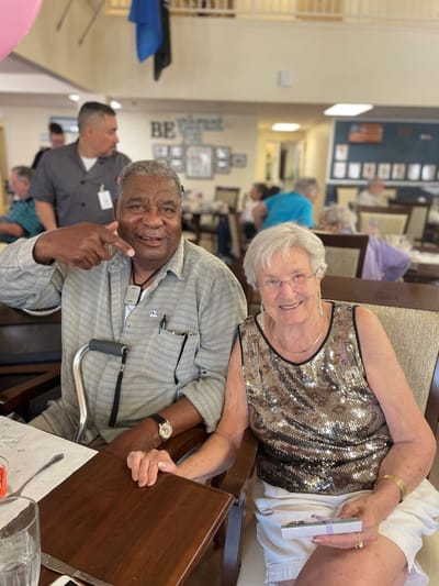Residents enjoying conversation in a common area