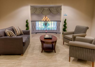 Interior view of a cozy common area with seating