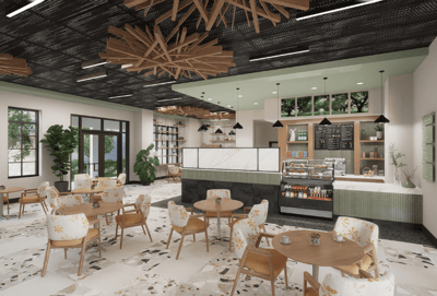 Bright dining area with tables and food display