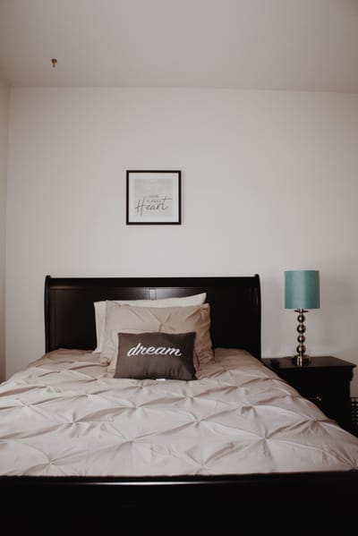 Cozy bedroom with soft bedding and decor