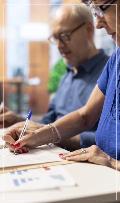 Residents engaged in an activity at a table