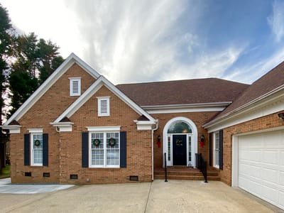 Exterior view of a senior living facility with front entrance
