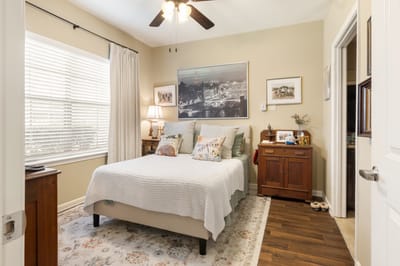 Cozy private resident room with a bed and decor
