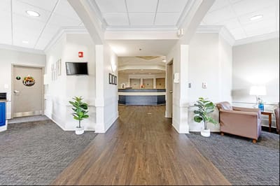 Bright interior lobby area with seating and reception