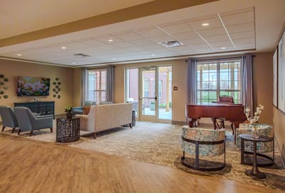 Interior common area with seating and a piano