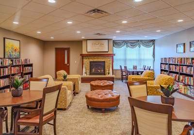 Cozy common area with bookshelves and seating