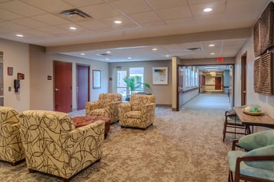 Bright common area with seating and natural light