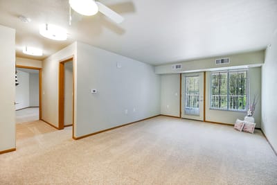 Interior of a spacious resident room with windows
