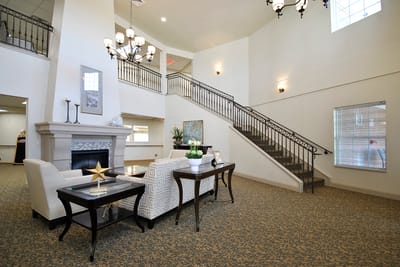 Bright and inviting lobby area with a staircase