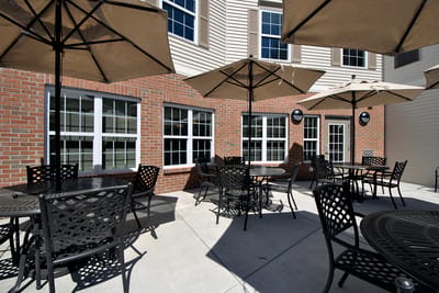 Outdoor seating area with umbrellas and tables