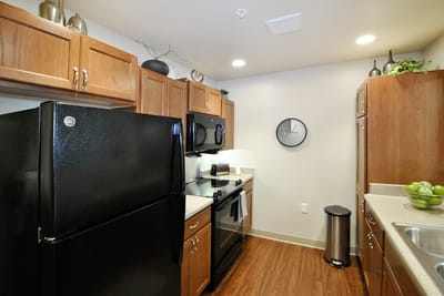 Interior view of a kitchen with modern appliances