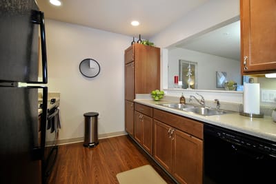 Well-lit kitchen with modern appliances and decor