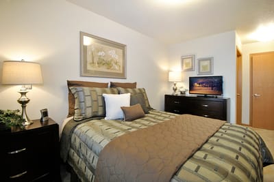 Cozy interior of a resident bedroom with decor