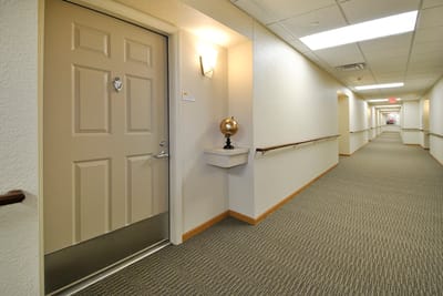 Interior hallway with a door and decorative element