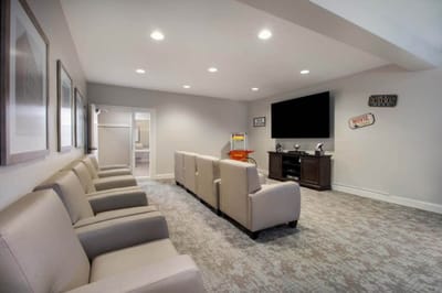 Common area with seating and TV