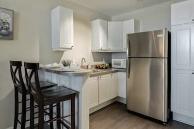 Bright interior kitchen area with dining space