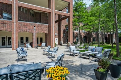 Outdoor seating area with plants and seating