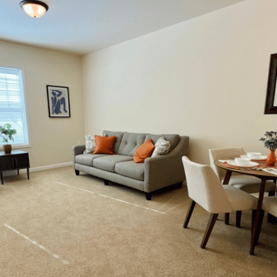 Cozy living space with a couch and dining area