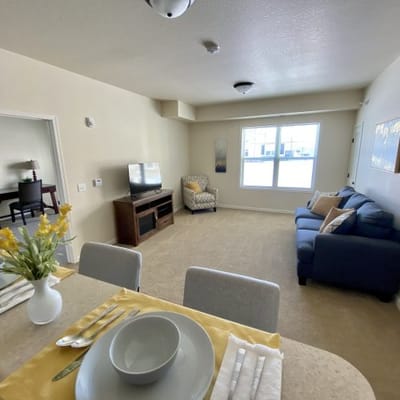 Cozy living area in a resident's unit with soft furnishings