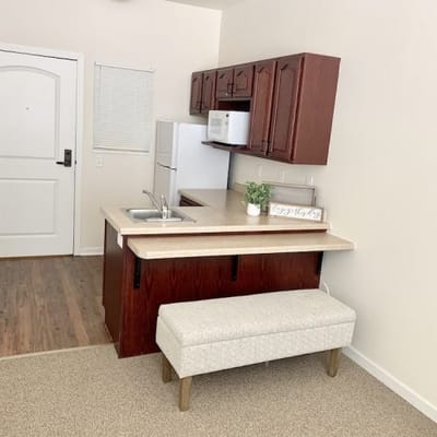 Cozy kitchenette area in a resident room