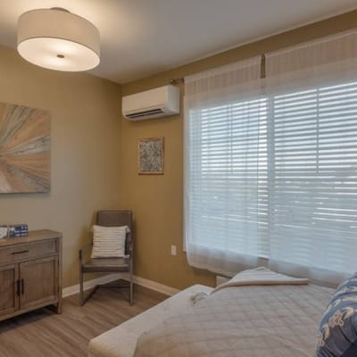 Cozy resident room with a single bed and natural light