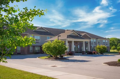 Exterior view of the Copper Trace facility with trees