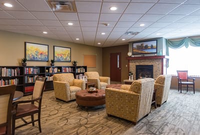 Cozy common area with seating and a fireplace