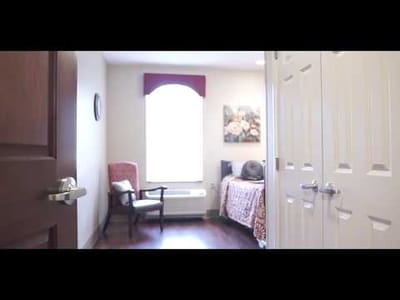 Interior view of a resident room with furnishings