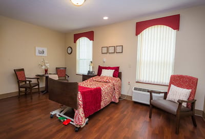 A cozy private resident room with warm decor