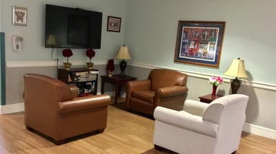 Cozy common area with seating and artwork